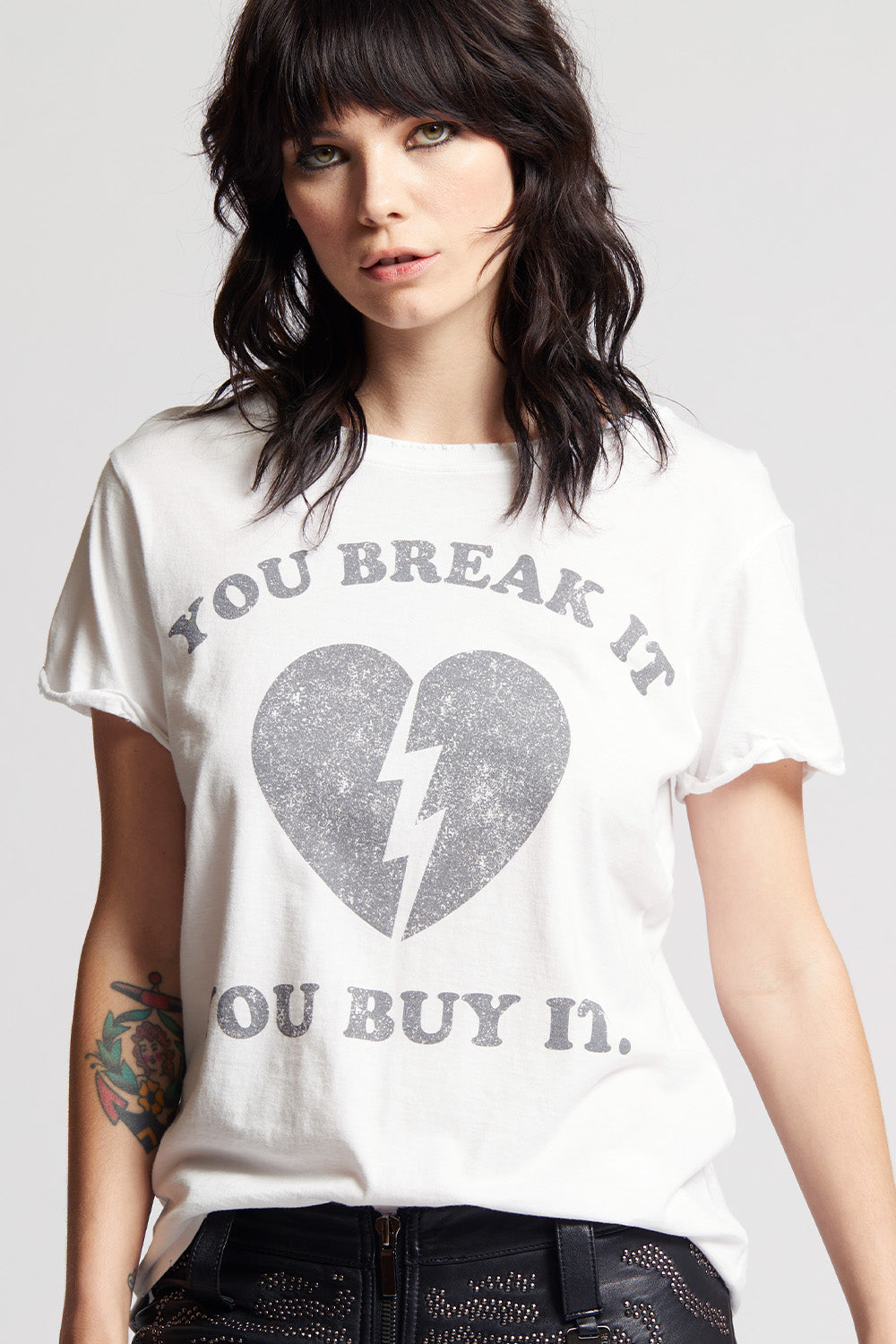 Women's You Break It You Buy It T-shirt in White with broken heart graphic
