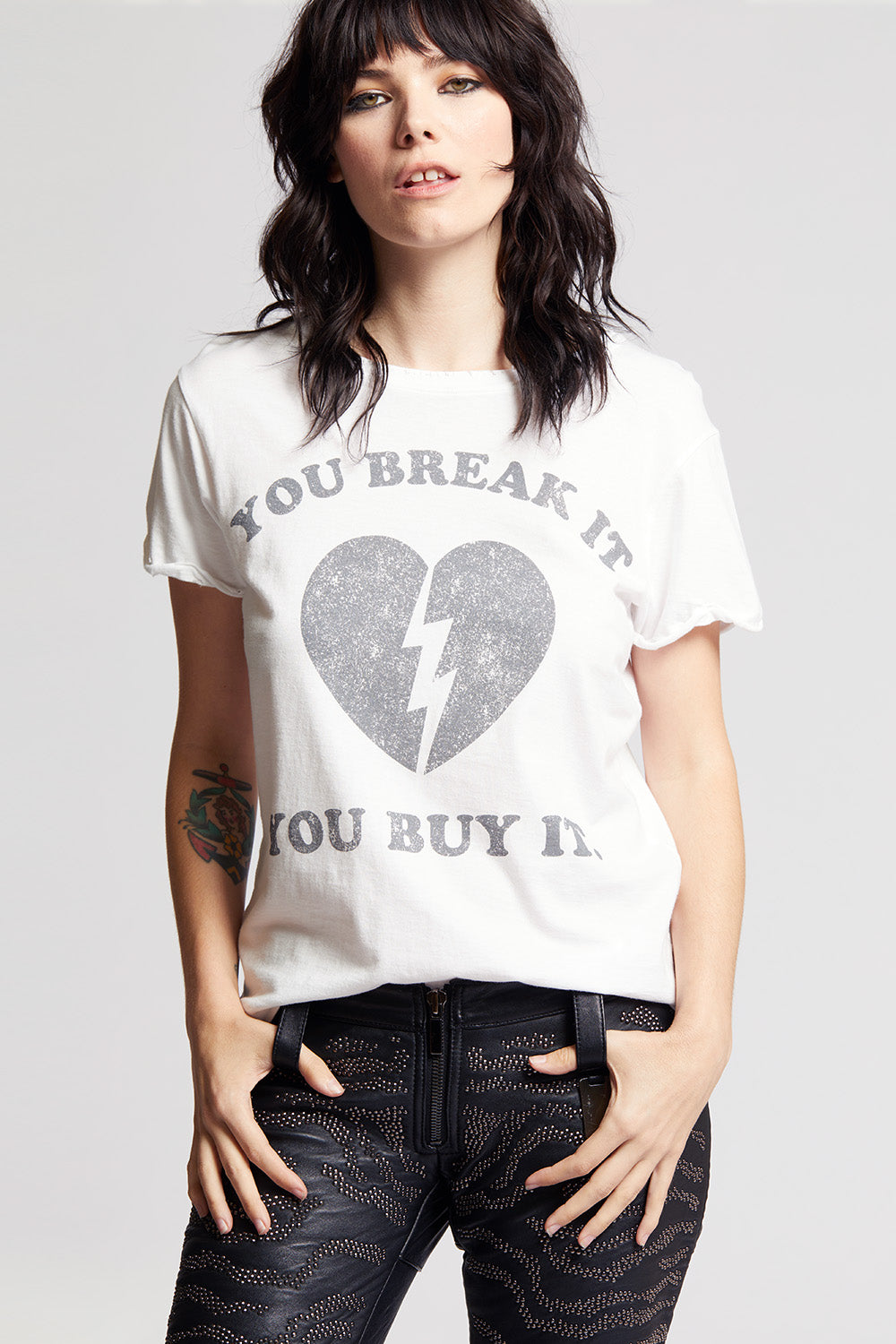 Women's You Break It You Buy It T-shirt in White with broken heart graphic